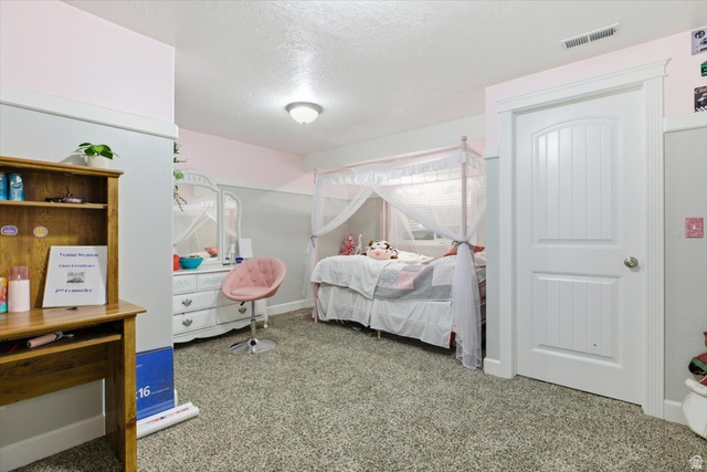 772 East 600 South Preston, ID 83263 - Photo 27 of 35 Spacious room featuring neutral carpet flooring and white baseboards