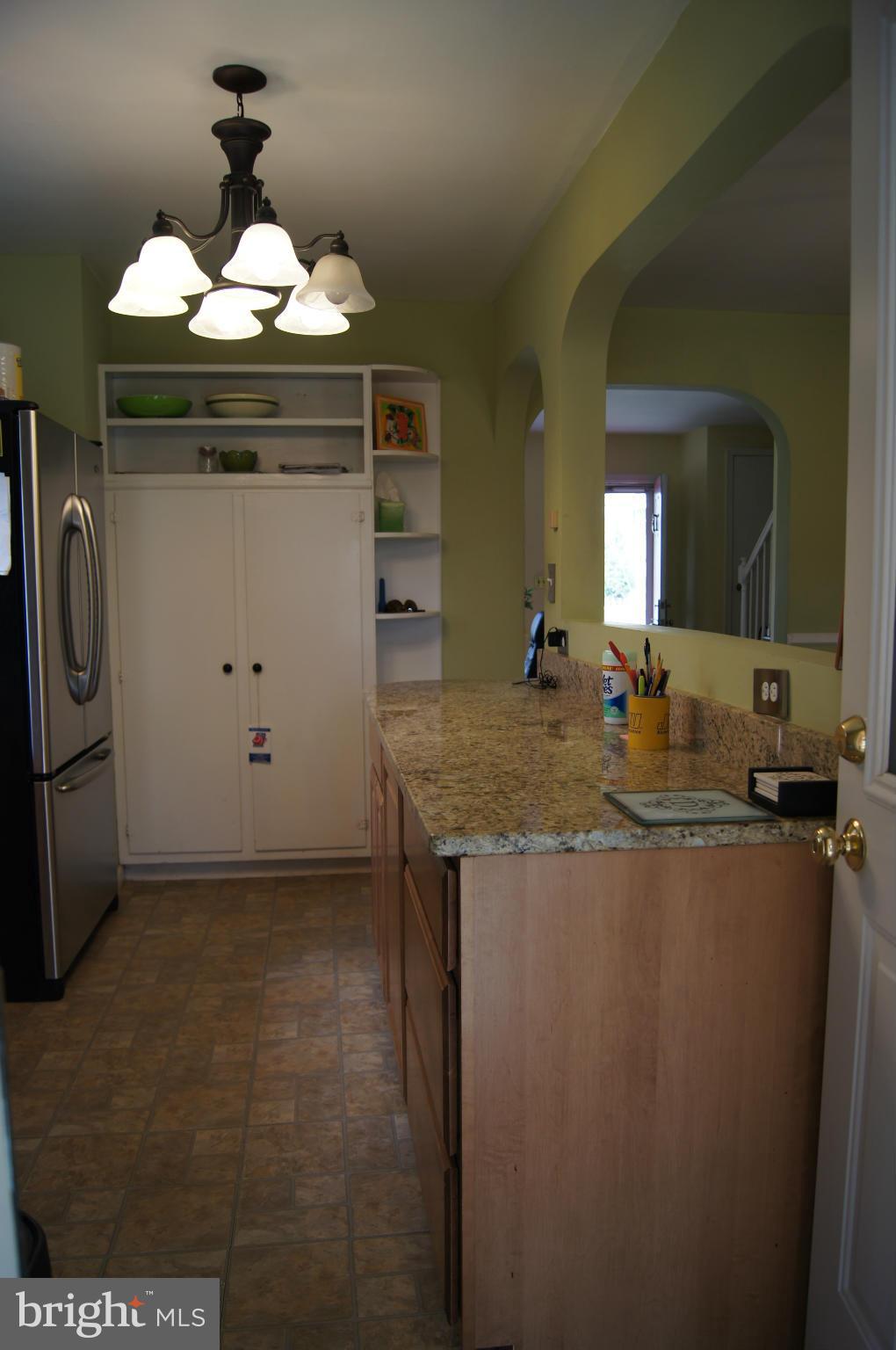 6607 Parkway Road Baltimore, MD 21239 - Photo 7 of 30 View of kitchen from family room