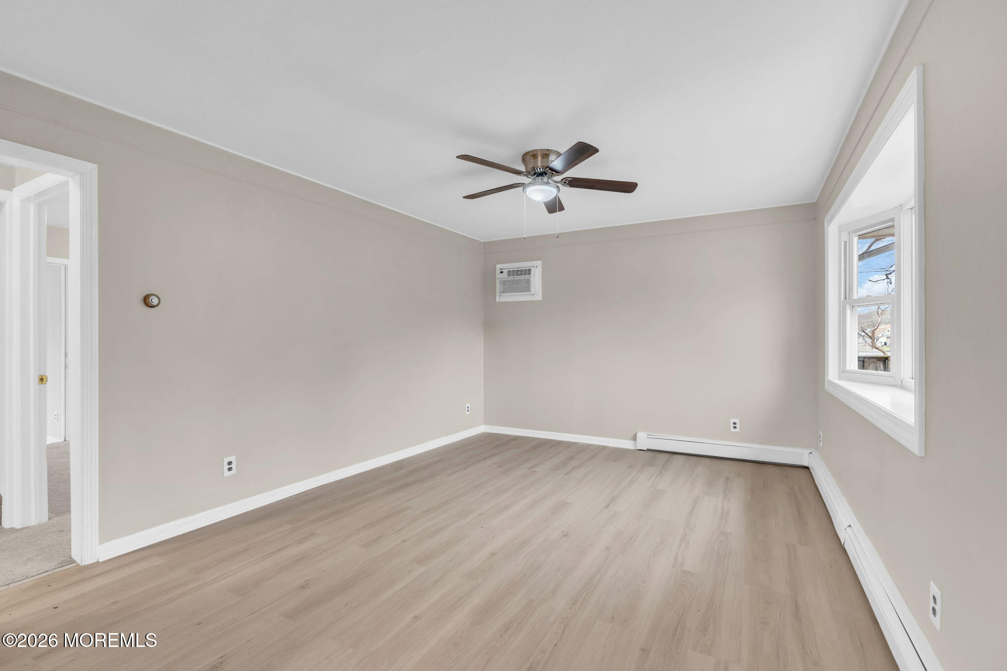 121 Harding Drive Brick, NJ 08724 - Photo 14 of 37 wooden floor in an empty room with a window