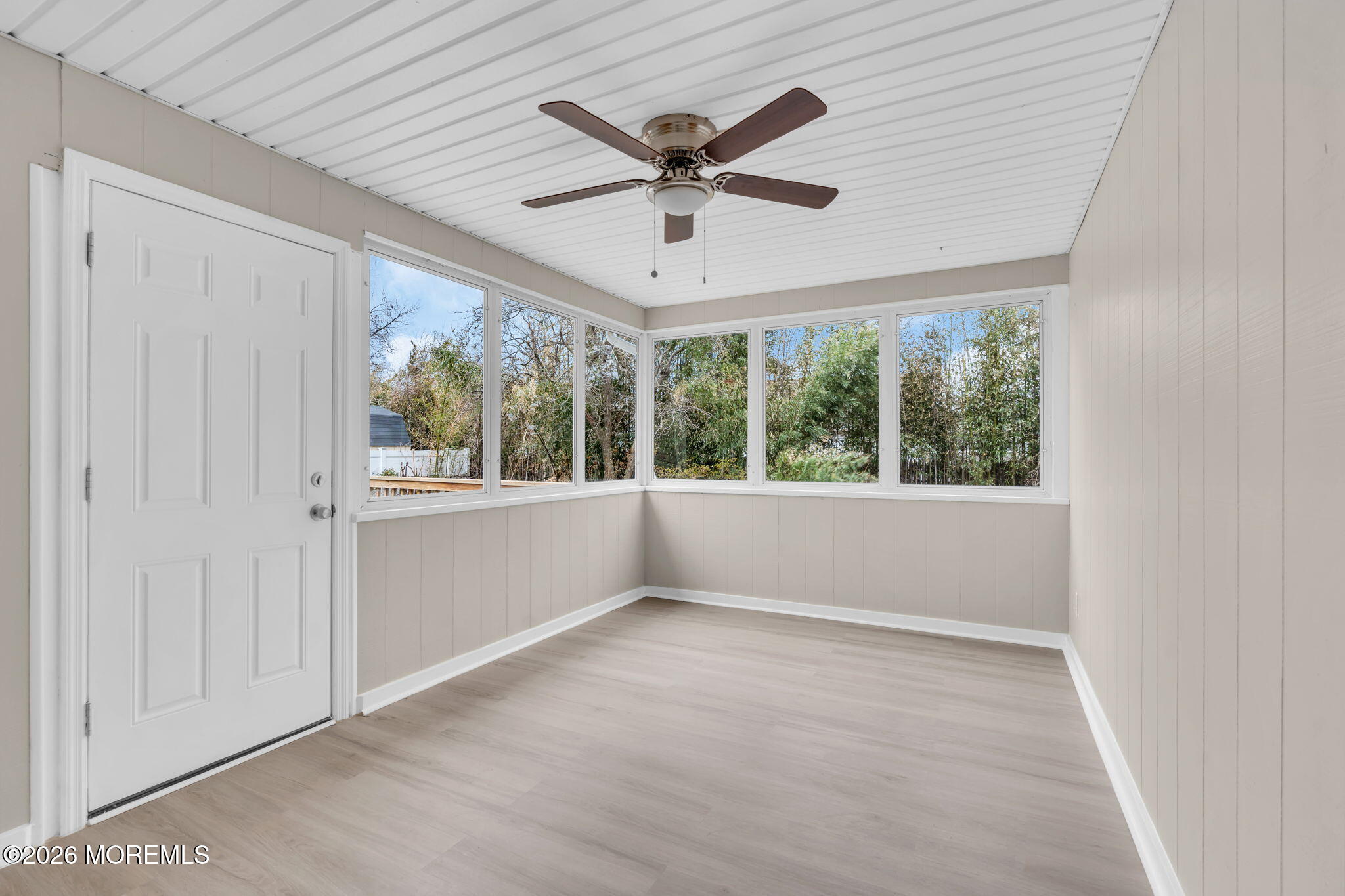 121 Harding Drive Brick, NJ 08724 - Photo 20 of 37 an empty room with windows and ceiling fan