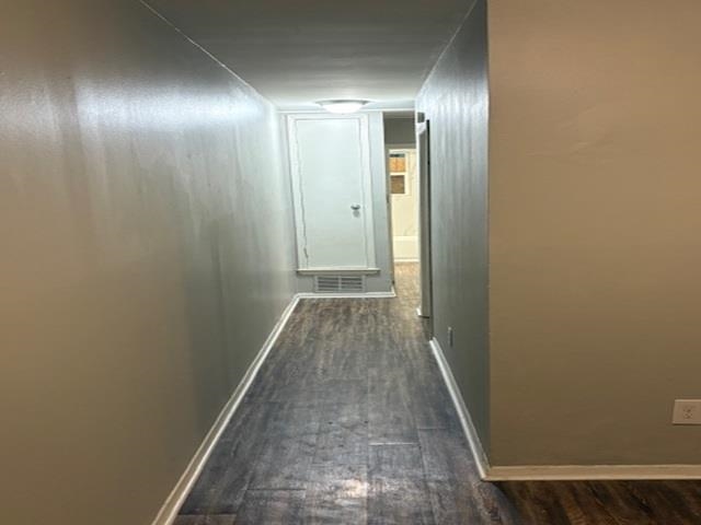 3268 Powell Avenue Memphis, TN 38112 - Photo 5 of 5 Hall with baseboards and dark wood-style floors