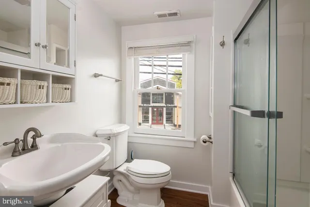 a bathroom with a sink and a toilet