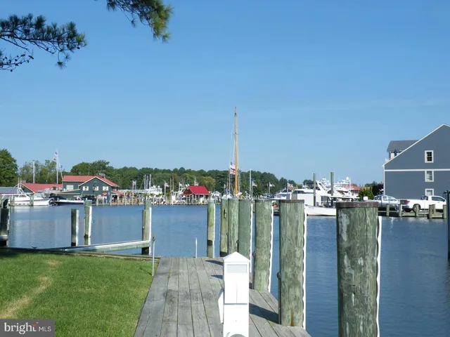 a view of a houses and city from a living room