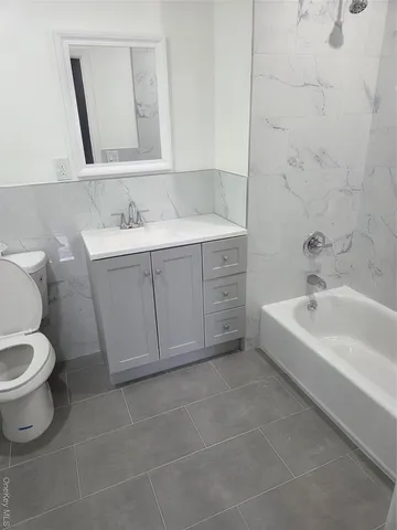 a view of cabinets and wooden floor