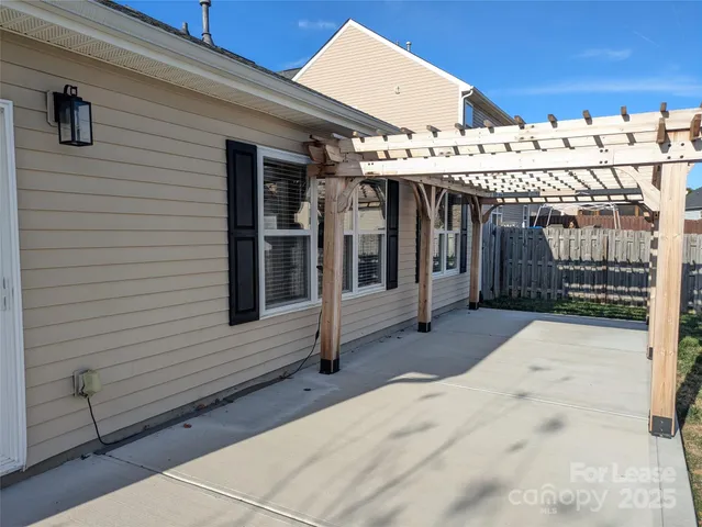 a view of a backyard with green space
