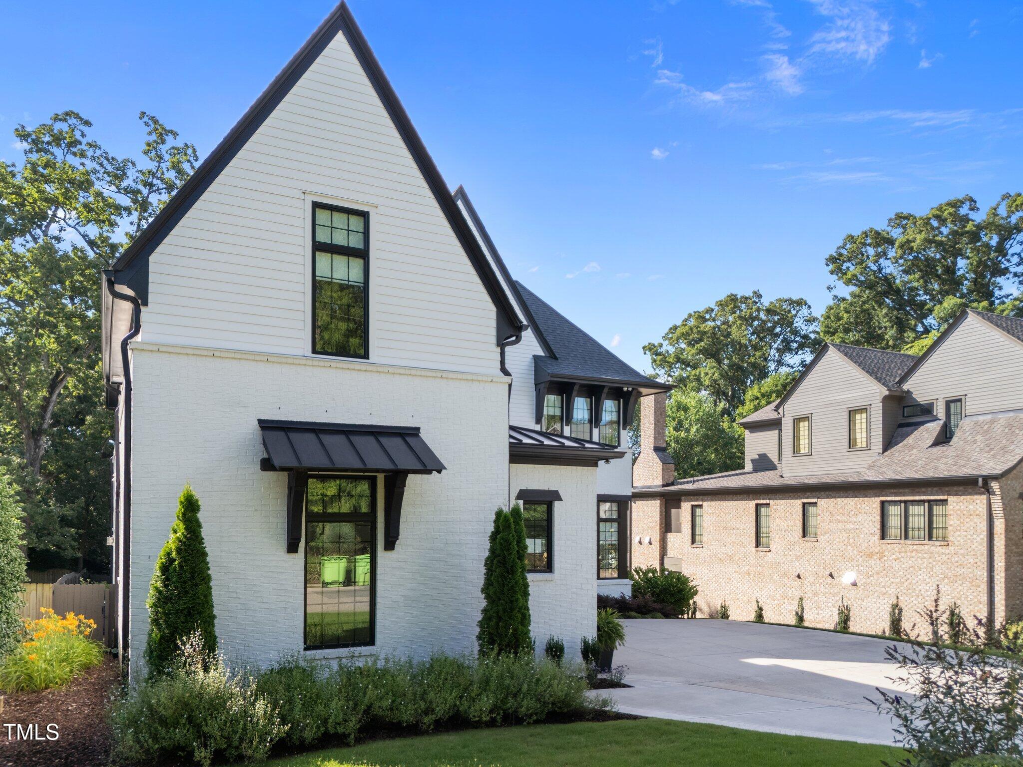 2114 Cowper Drive Raleigh, NC 27608 - Photo 93 of 93 21-web-or-mls-DJI_20250619091322_0616_D