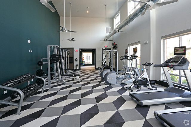 670 East Algonquin Road, Unit 4409 Schaumburg, IL 60173 - Photo 16 of 23 a room with lots of chairs and mirrors