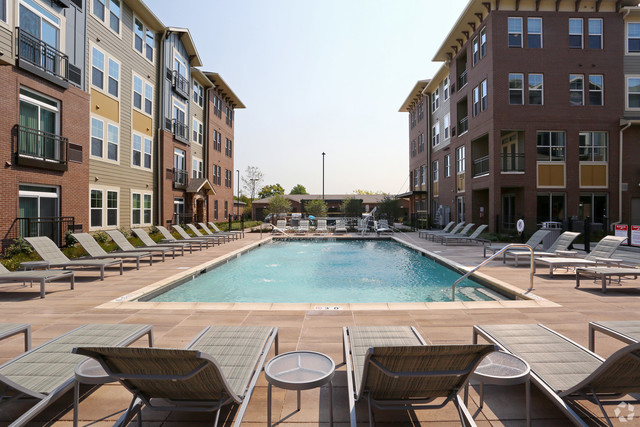 670 East Algonquin Road, Unit 4409 Schaumburg, IL 60173 - Photo 17 of 23 a view of outdoor space yard swimming pool and patio