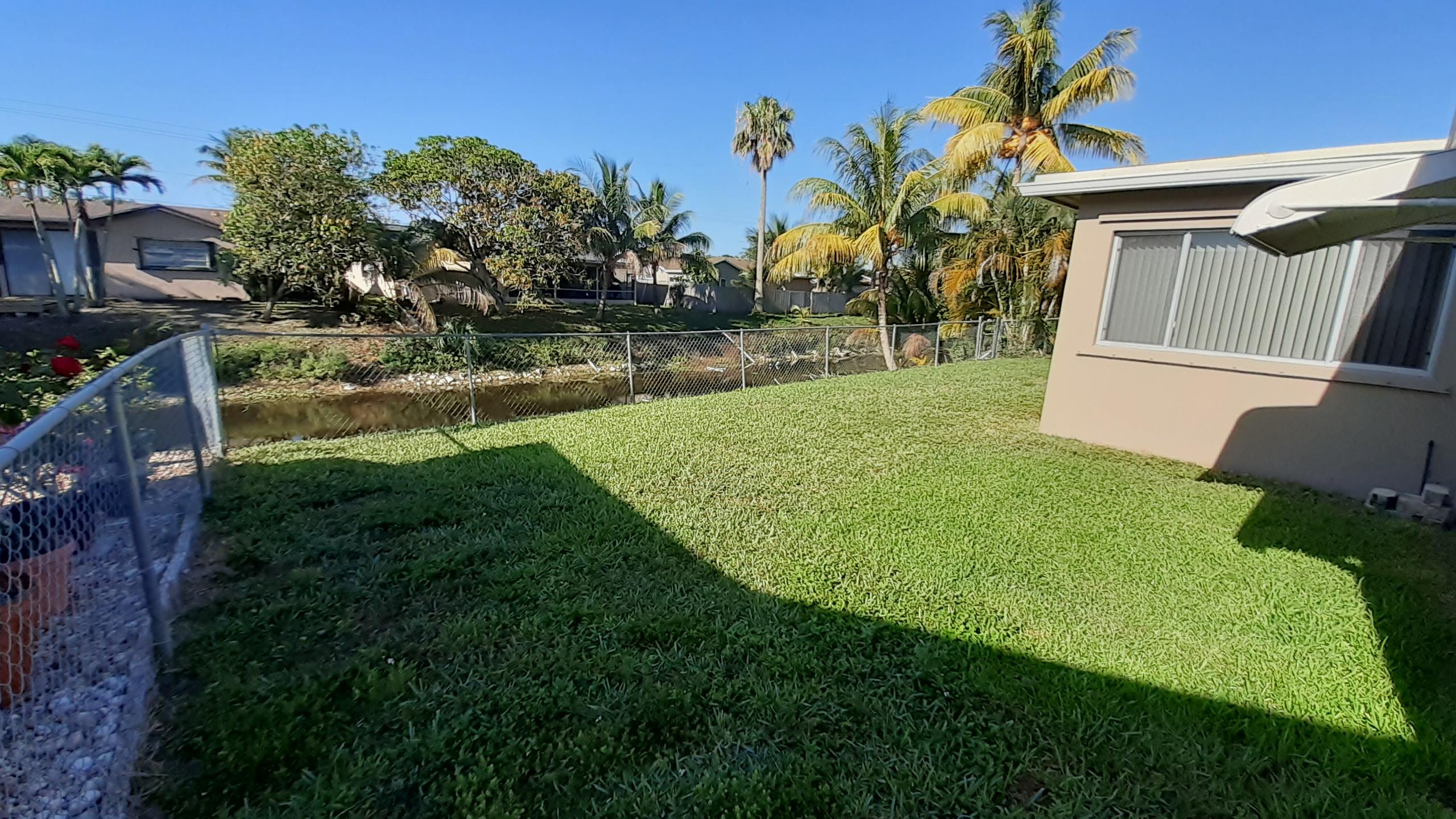 9266 Southwest 2nd Street Boca Raton, FL 33428 - Photo 20 of 21 Side Yard
