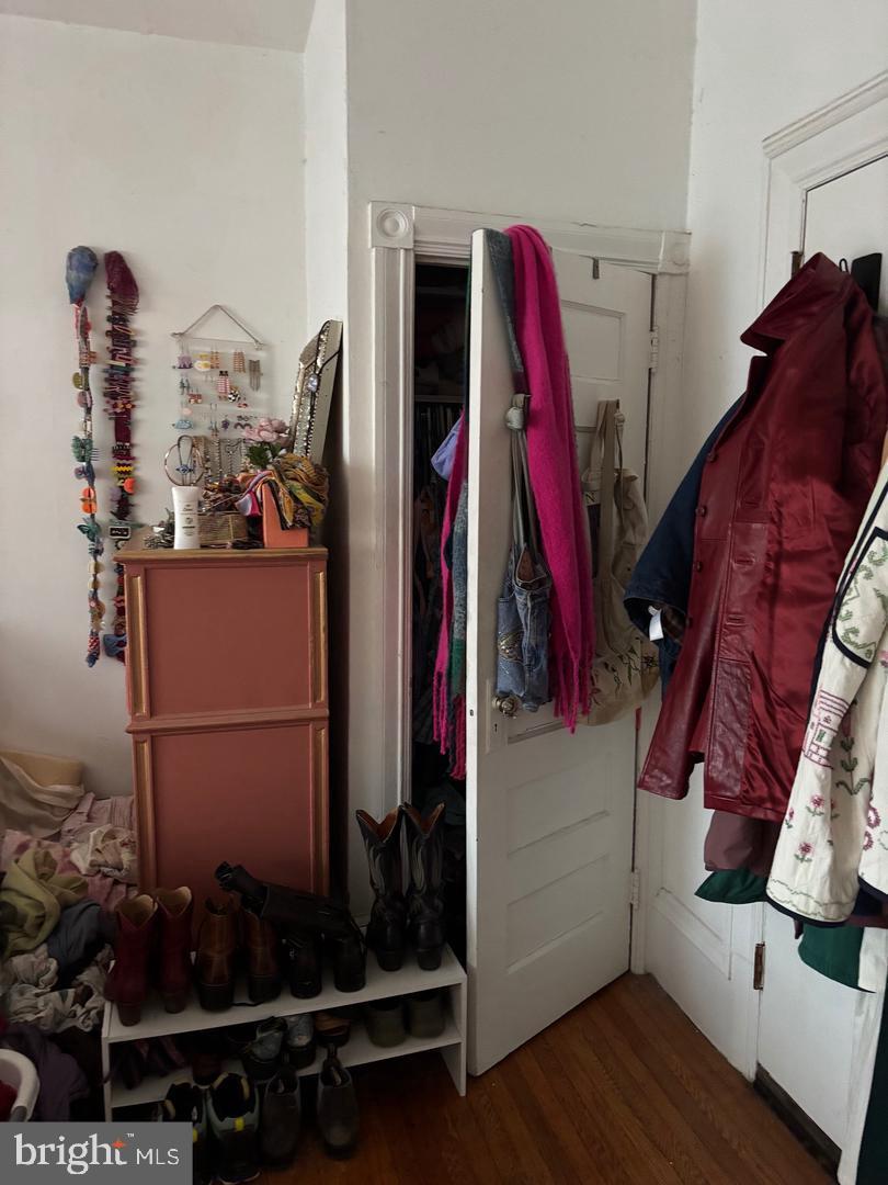 259 South 46th Street, Unit 2F Philadelphia, PA 19139 - Photo 10 of 14 a view of walk in closet with clothes and shoes