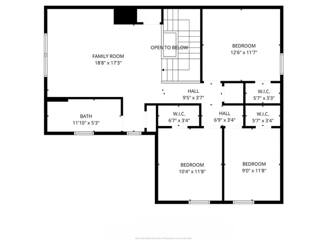 a picture of a bench in front of a gate