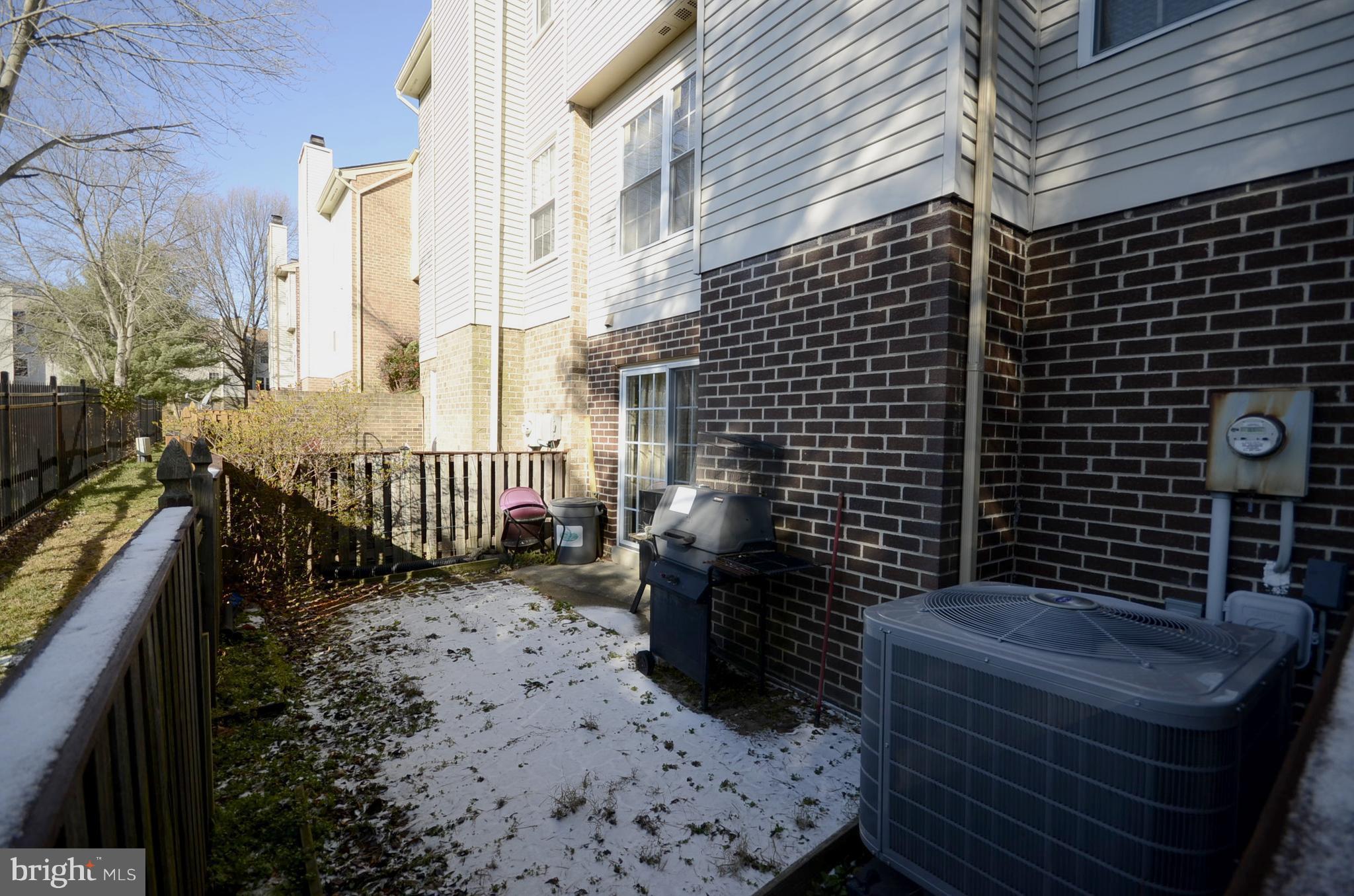 3504 Banquo Drive, Unit 893 Silver Spring, MD 20906 - Photo 22 of 23 a view of a balcony with a bench