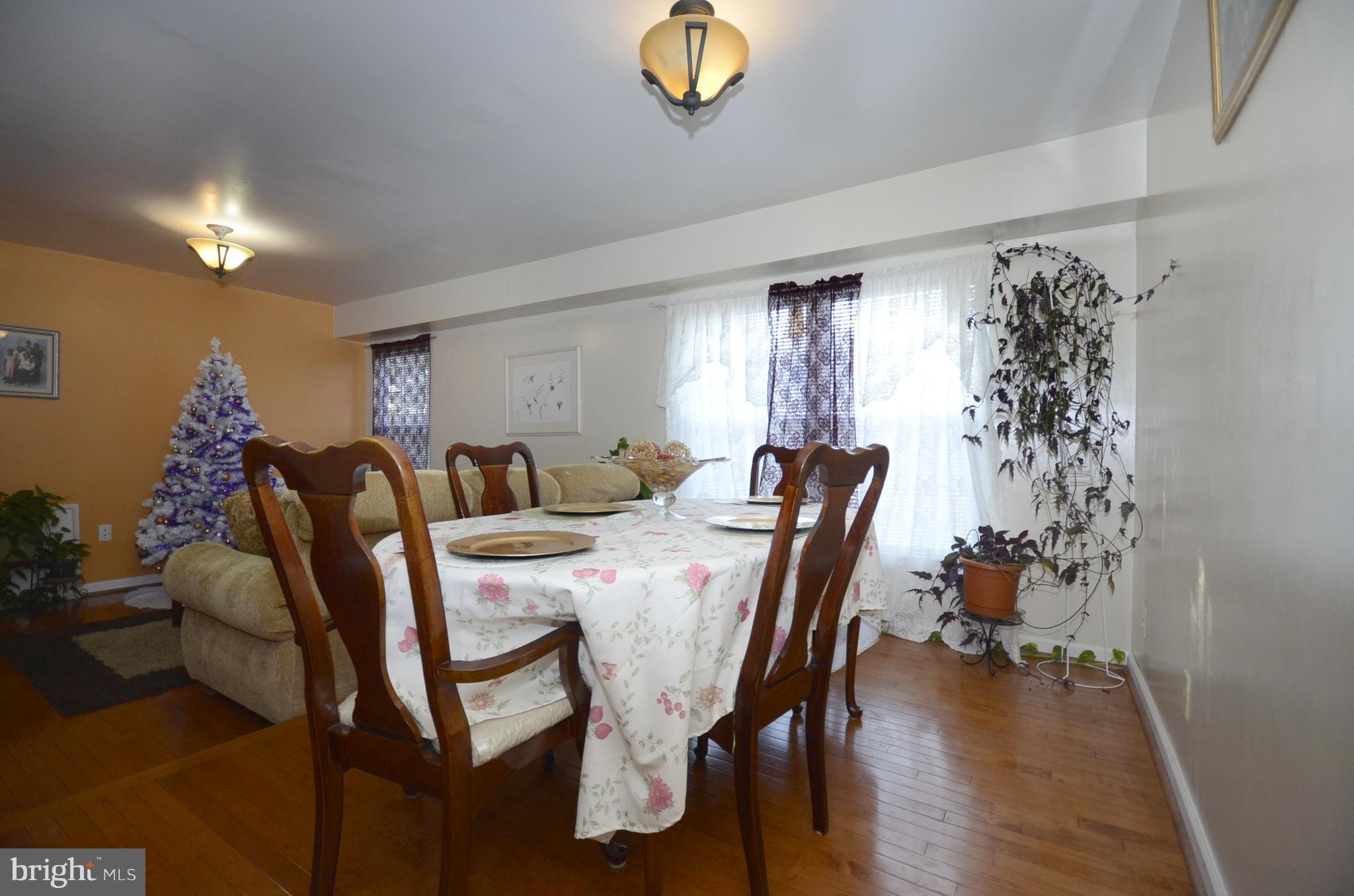3504 Banquo Drive, Unit 893 Silver Spring, MD 20906 - Photo 10 of 23 a view of a dining room with furniture and window