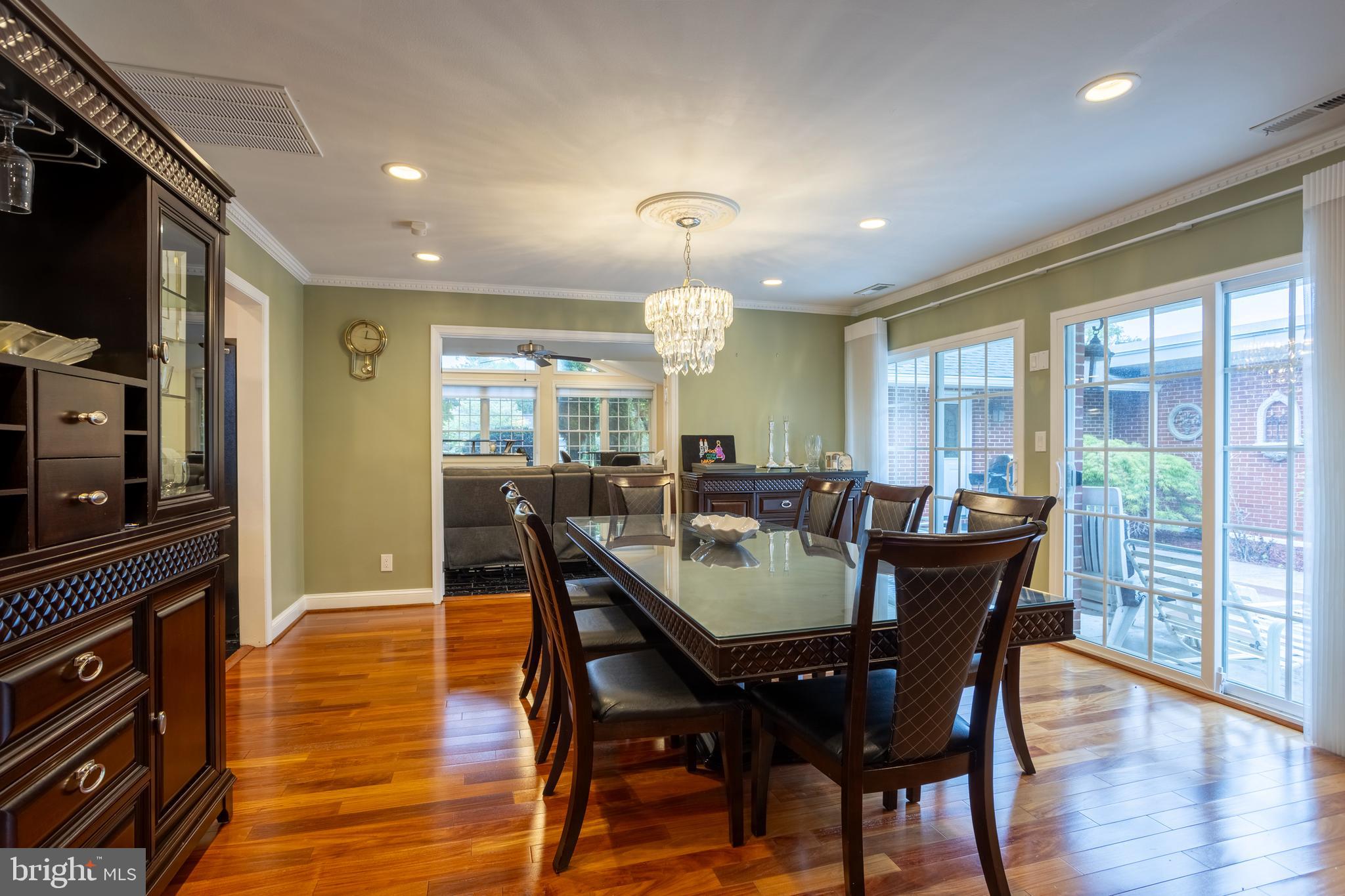 7908 Ivy Lane Baltimore, MD 21208 - Photo 11 of 90 a view of a dining room with furniture window and wooden floor