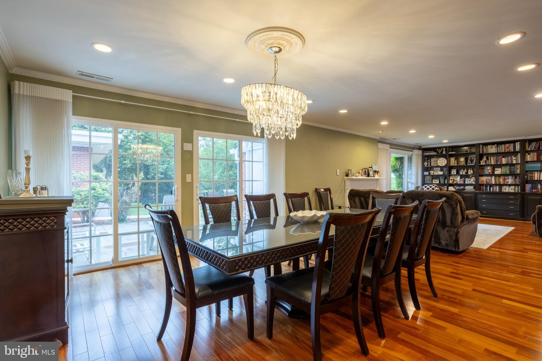 7908 Ivy Lane Baltimore, MD 21208 - Photo 12 of 90 a view of a dining room with furniture window and wooden floor
