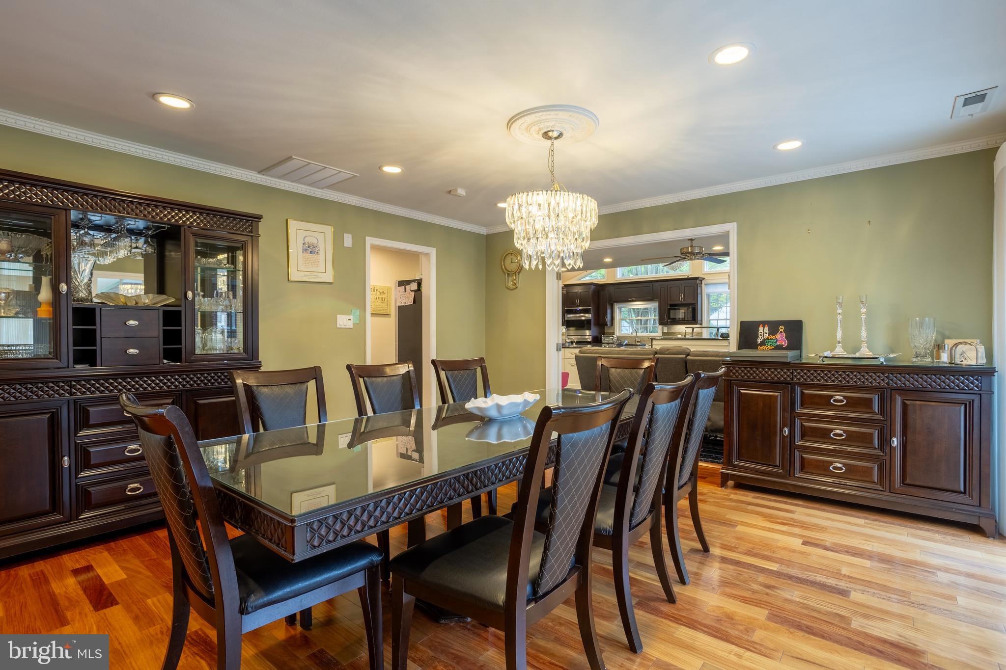 7908 Ivy Lane Baltimore, MD 21208 - Photo 14 of 90 a view of a a dining room with furniture window and wooden floor
