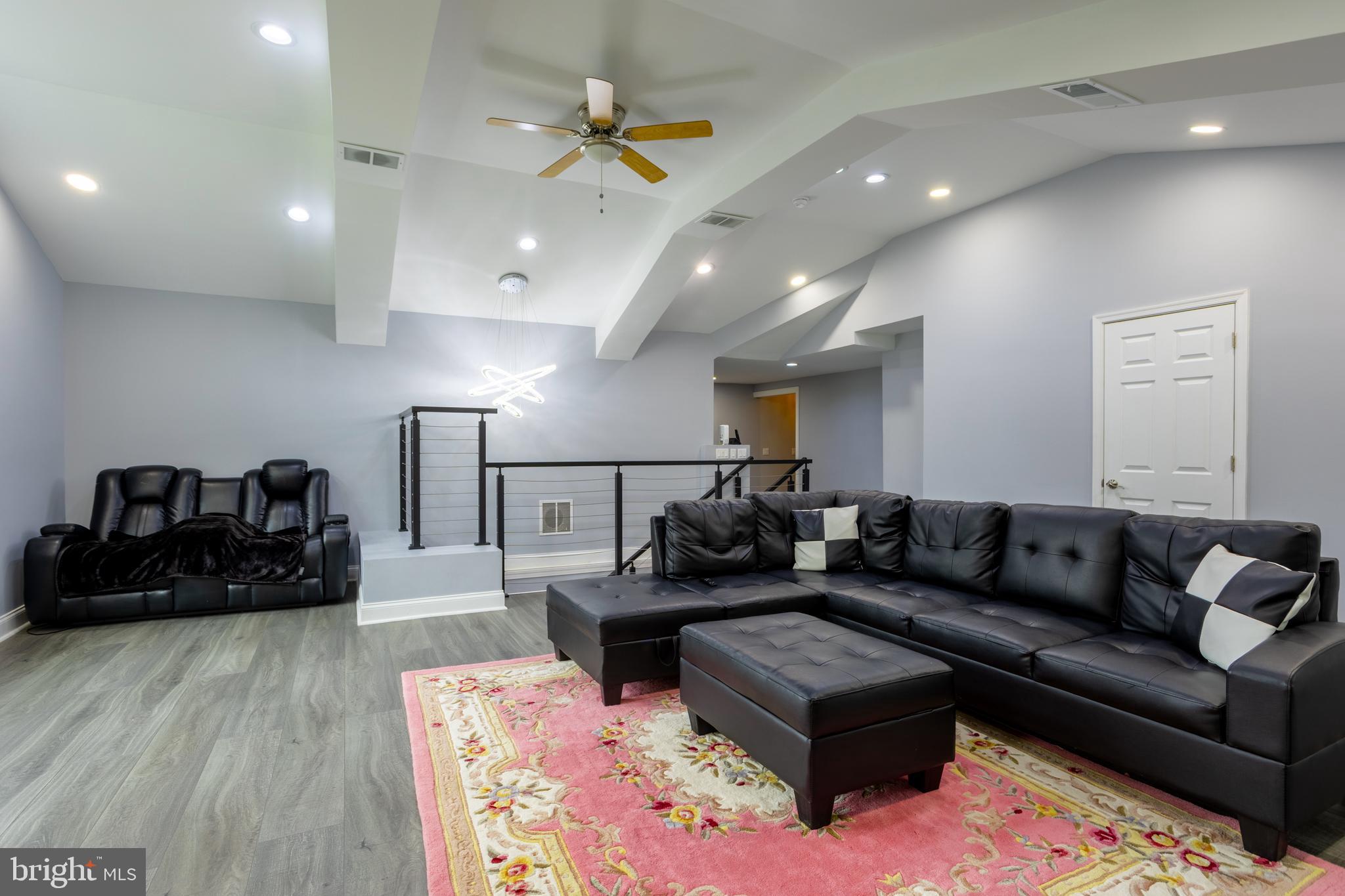 7908 Ivy Lane Baltimore, MD 21208 - Photo 54 of 90 a living room with furniture and wooden floor