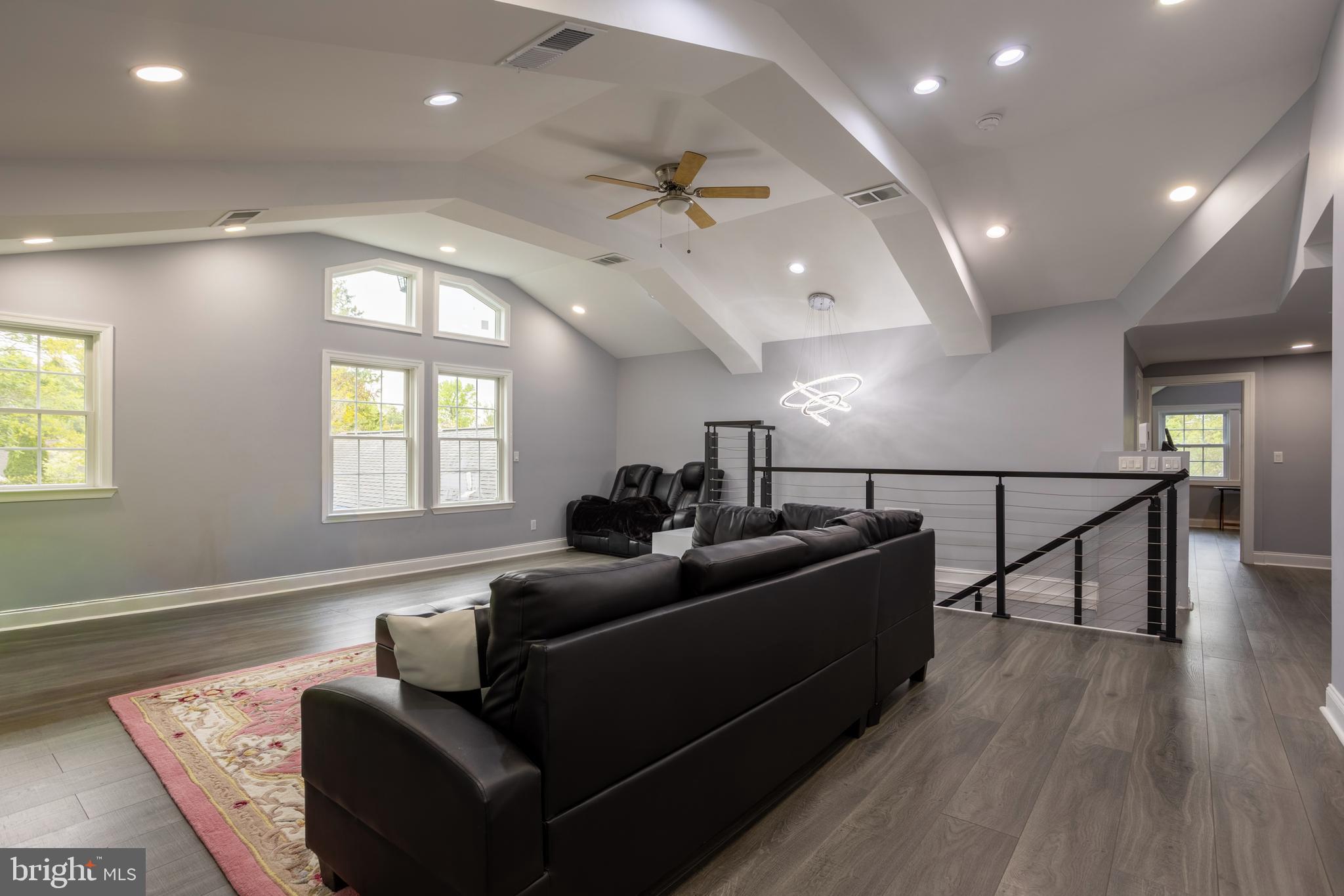 7908 Ivy Lane Baltimore, MD 21208 - Photo 55 of 90 a living room with furniture and a wooden floor