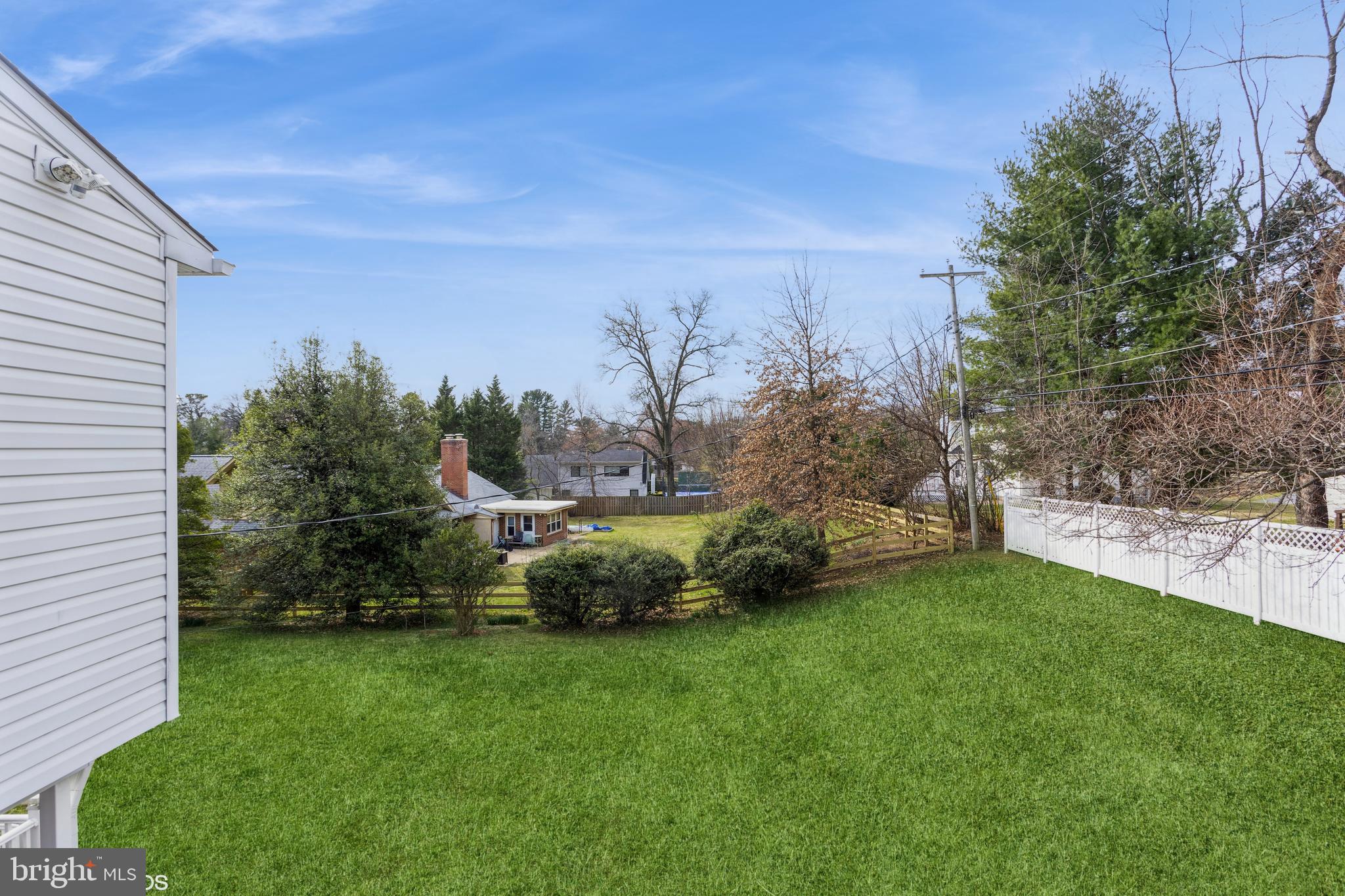 7908 Ivy Lane Baltimore, MD 21208 - Photo 89 of 90 a view of a backyard with large trees