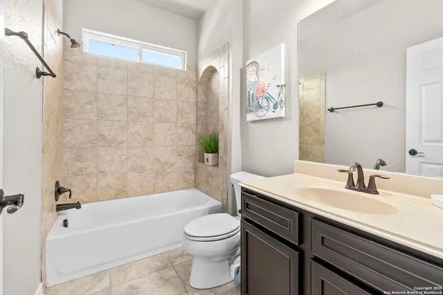 a bathroom with a sink a toilet and a bathtub