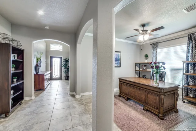 a very nice looking living room with a large window