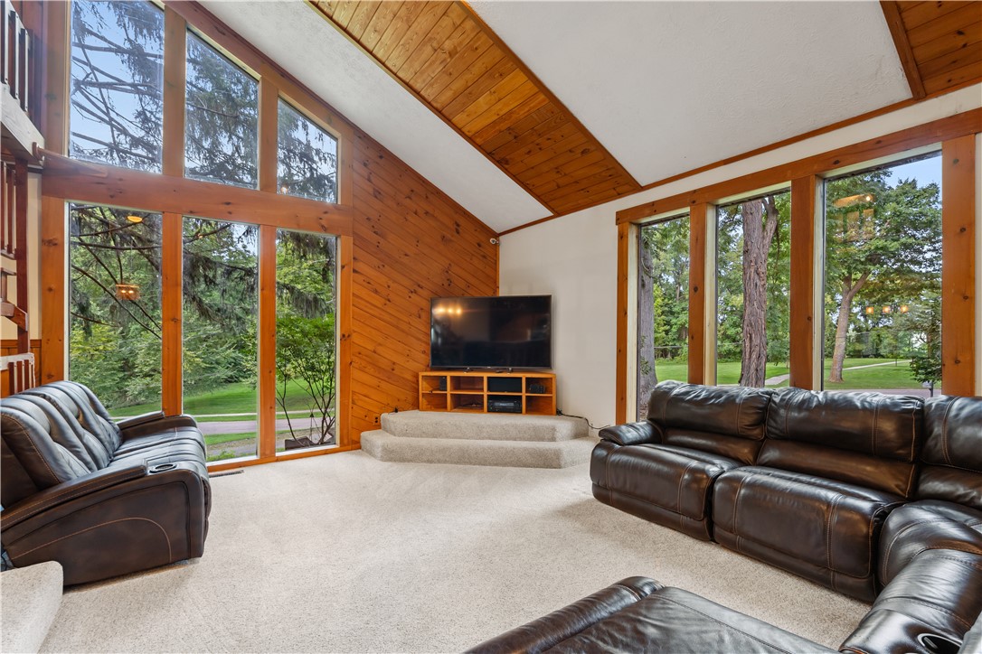301 Spring Street Avon, NY 14414 - Photo 22 of 50 Natural light abounds throughout the living room
