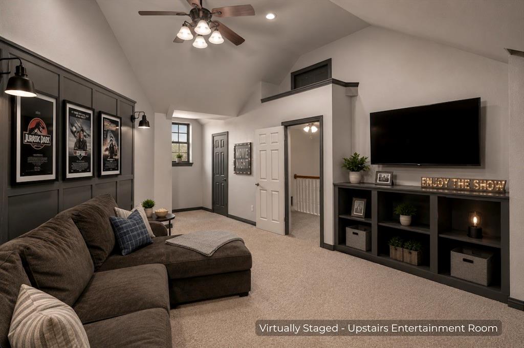 15 Trail Ridge Drive Melissa, TX 75454 - Photo 32 of 38 a living room with furniture and a flat screen tv