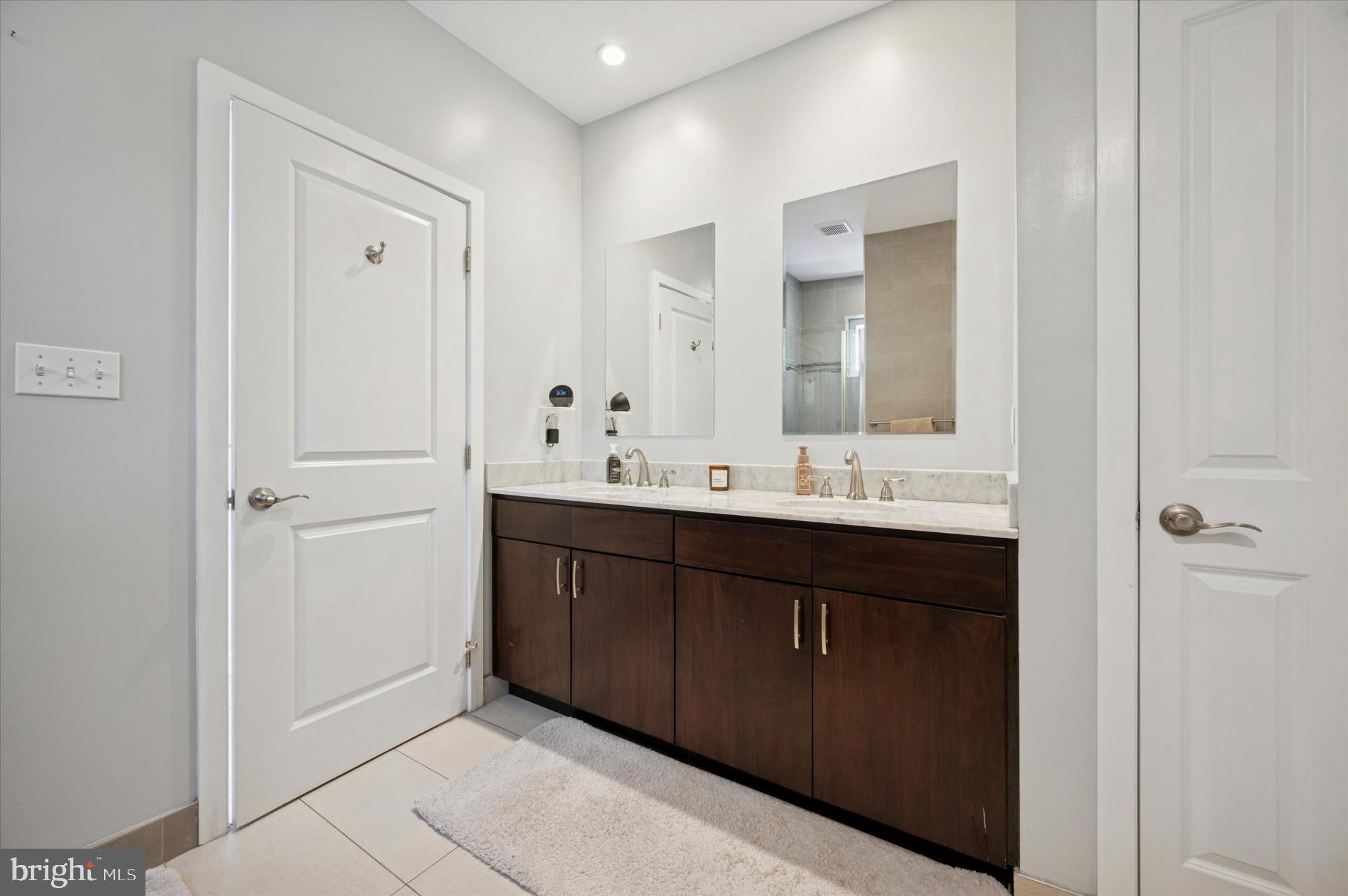 4128 Apple Street Philadelphia, PA 19127 - Photo 15 of 25 a bathroom with a sink and a mirror