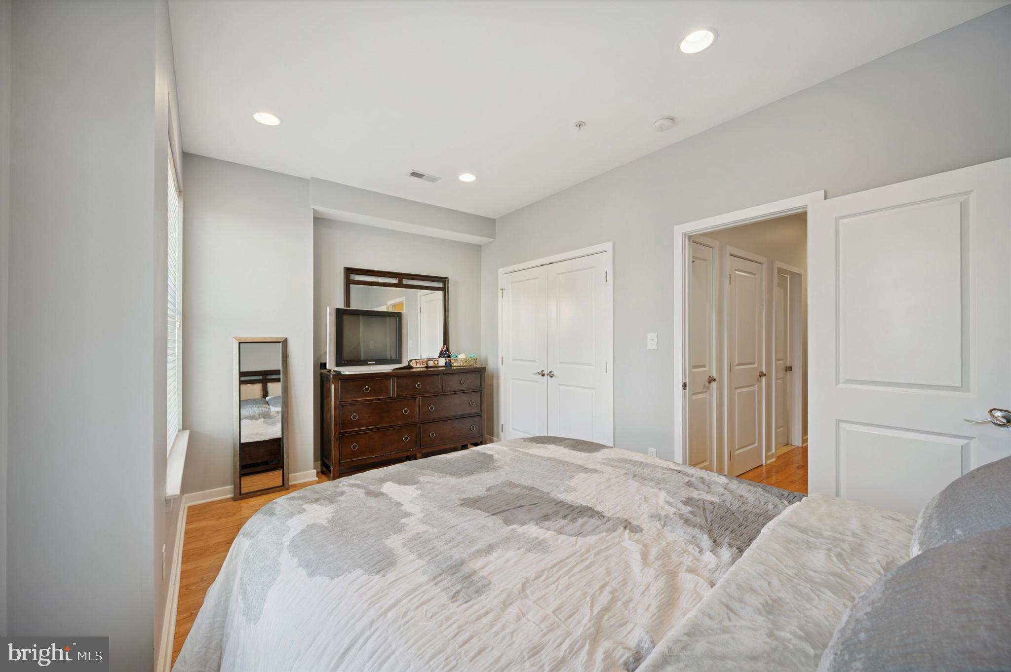 4128 Apple Street Philadelphia, PA 19127 - Photo 18 of 25 a bedroom with a bed and a bathroom