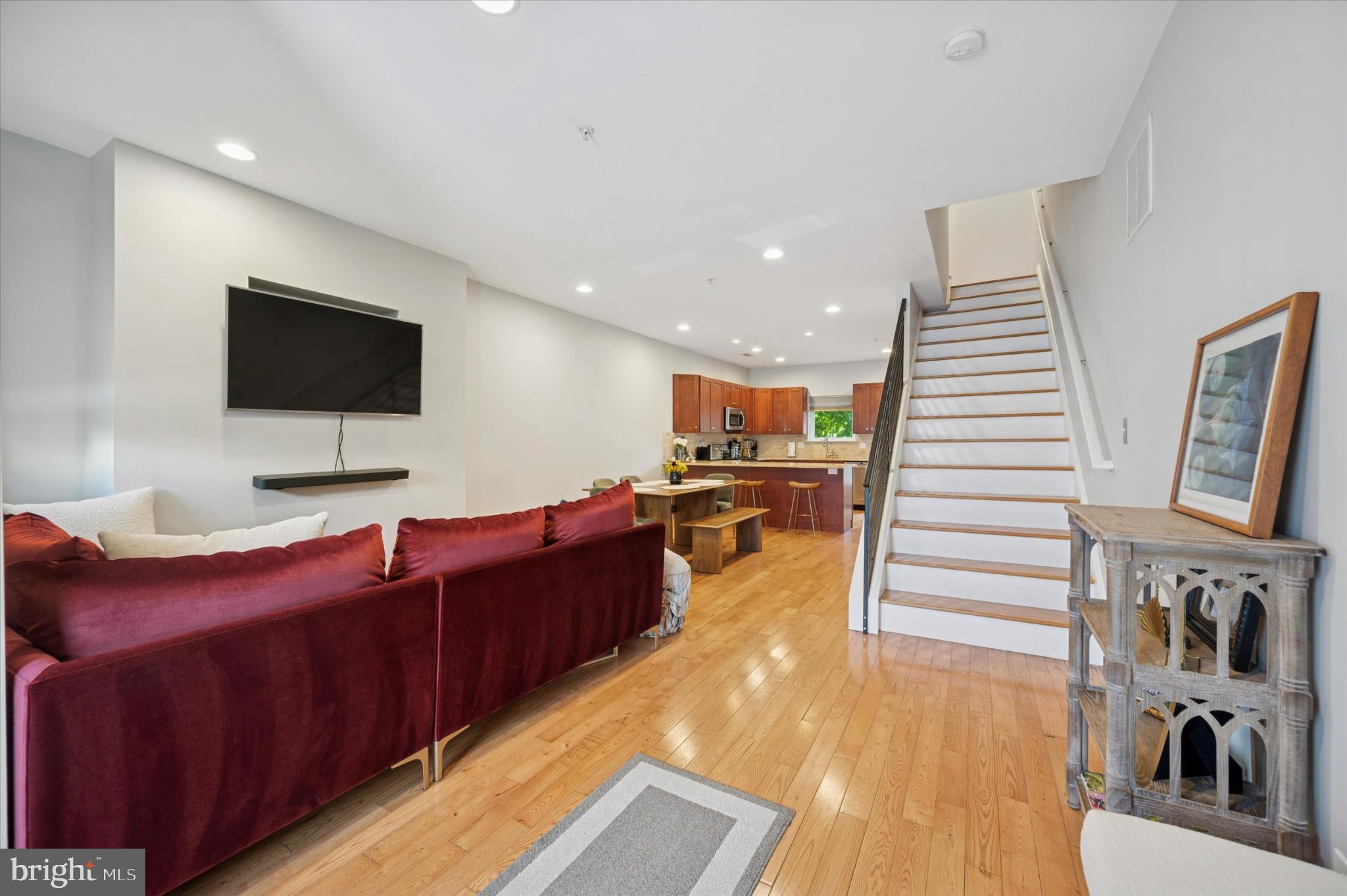 4128 Apple Street Philadelphia, PA 19127 - Photo 25 of 25 a living room with furniture and a flat screen tv