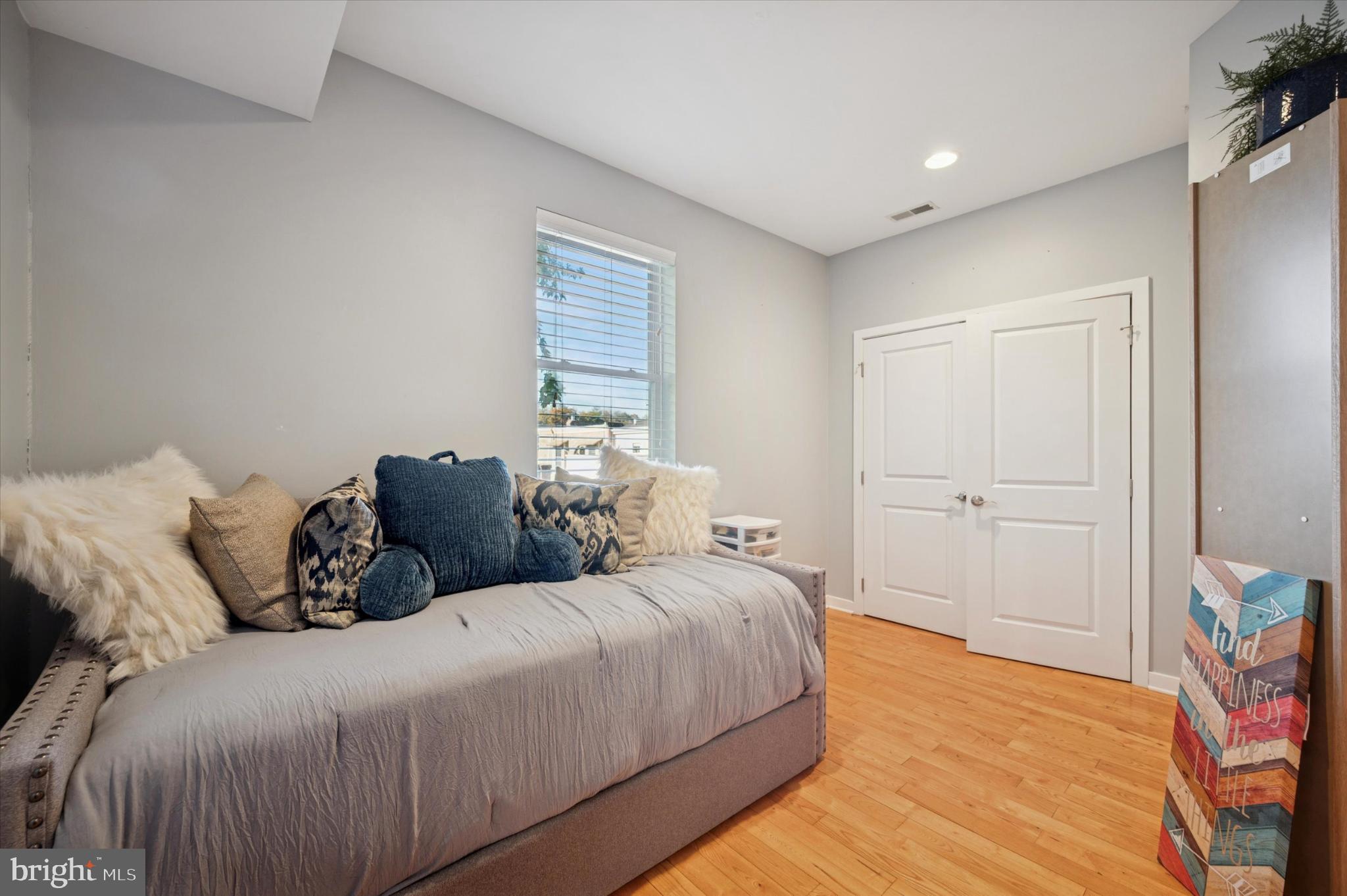 4128 Apple Street Philadelphia, PA 19127 - Photo 20 of 25 a bedroom with a bed and a couch