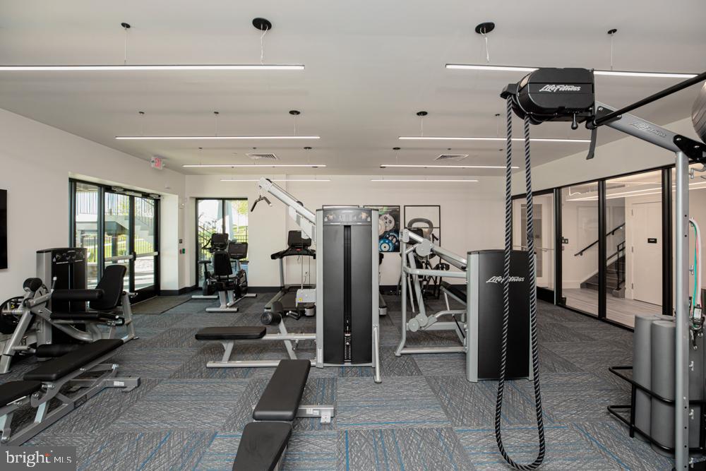573 Trifecta Road, Unit 313 Downingtown, PA 19335 - Photo 39 of 66 a view of a room with gym equipment