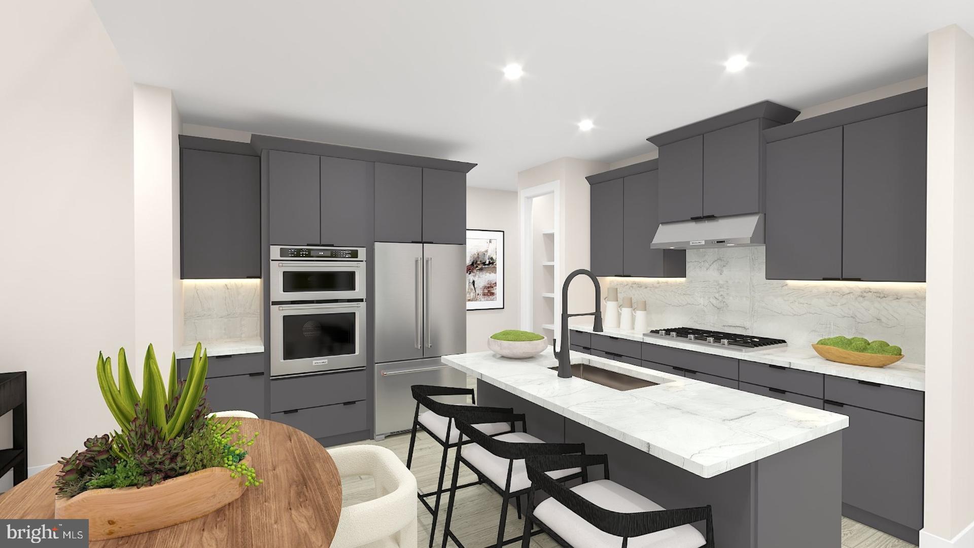 573 Trifecta Road, Unit 313 Downingtown, PA 19335 - Photo 65 of 66 a kitchen with stainless steel appliances kitchen island granite countertop a refrigerator and a stove top oven