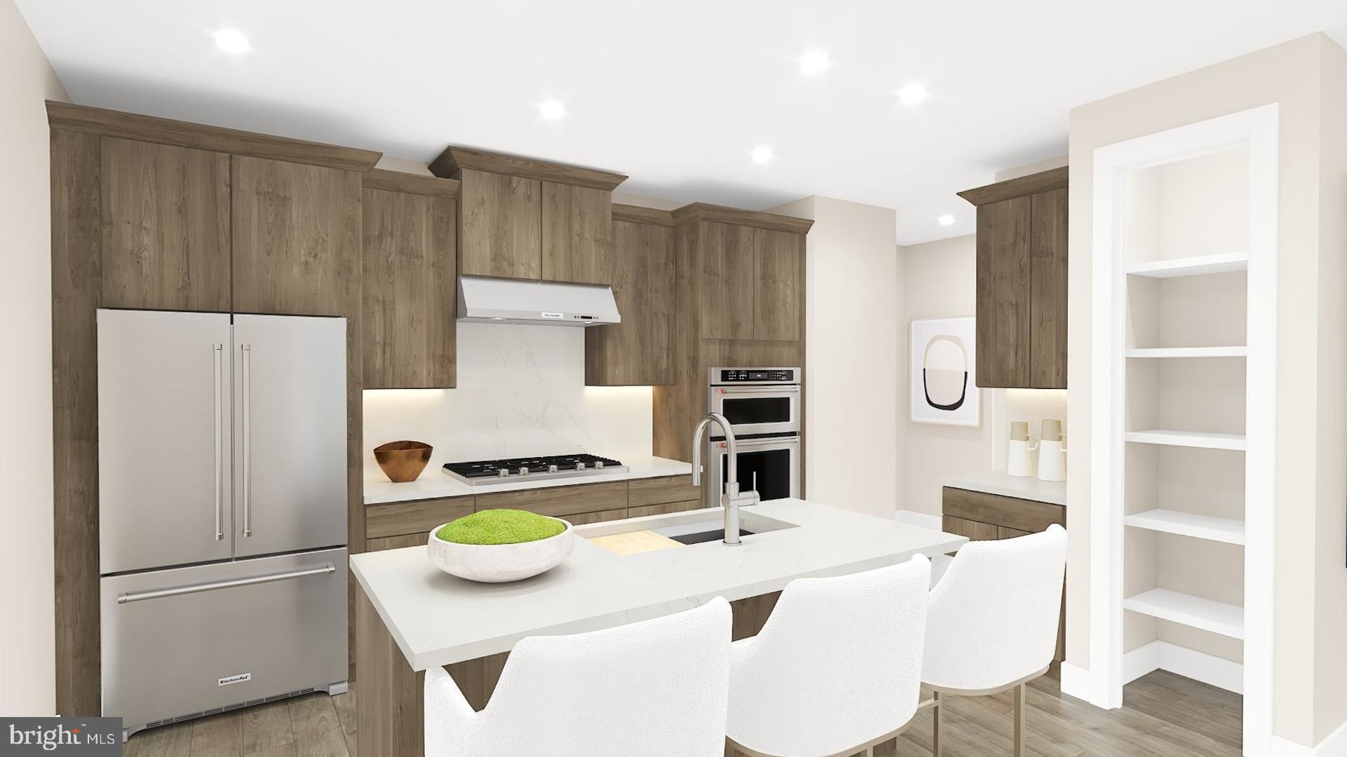 573 Trifecta Road, Unit 313 Downingtown, PA 19335 - Photo 66 of 66 a kitchen with stainless steel appliances kitchen island granite countertop a refrigerator and a stove