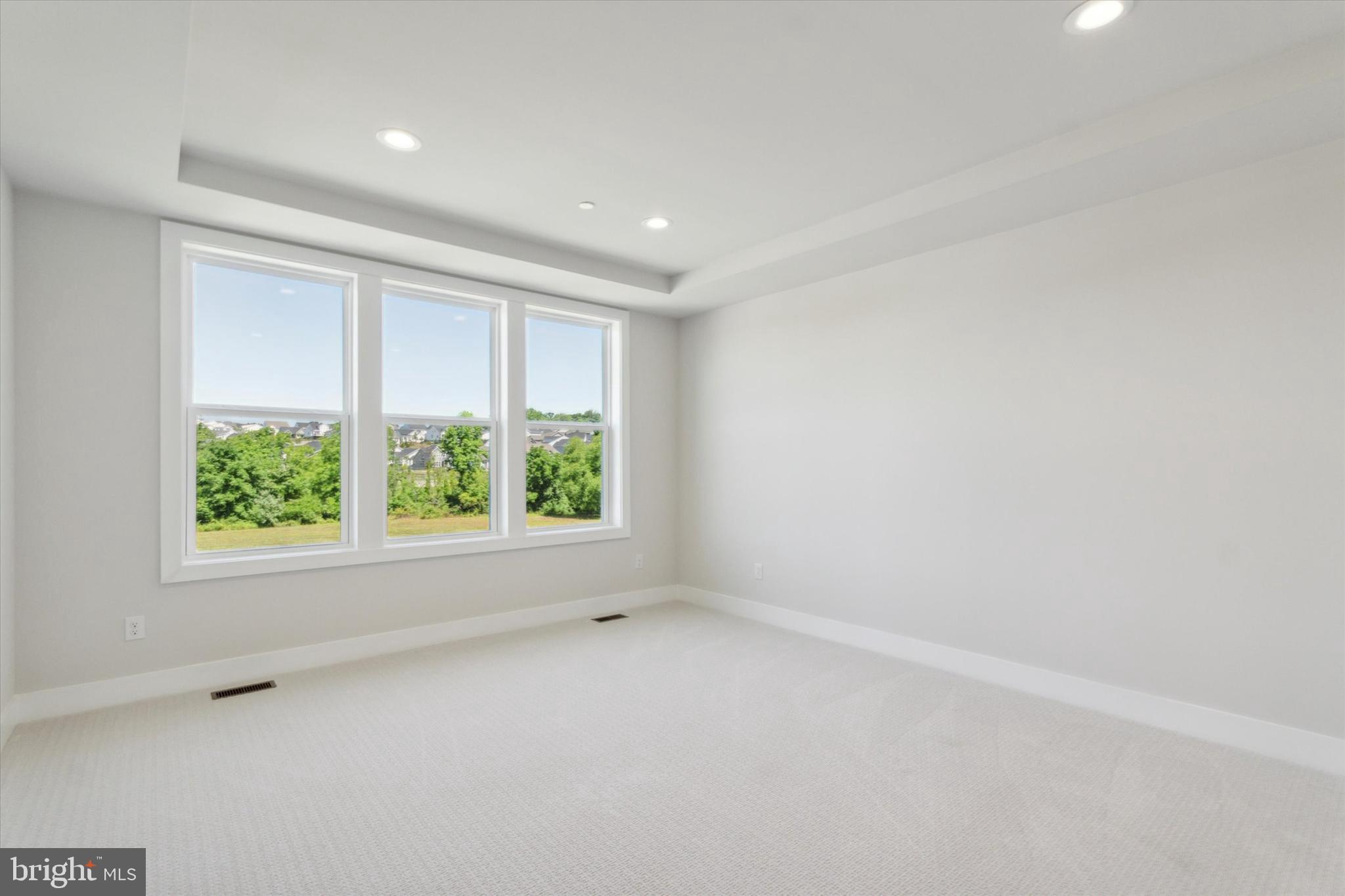 573 Trifecta Road, Unit 313 Downingtown, PA 19335 - Photo 8 of 66 an empty room with windows