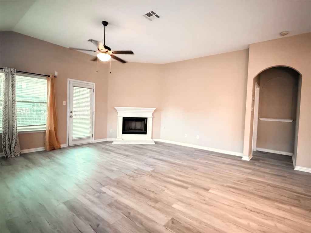 1548 Tonia Loop Round Rock, TX 78665 - Photo 13 of 29 a view of empty room with wooden floor and fan