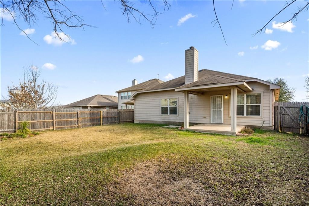 1548 Tonia Loop Round Rock, TX 78665 - Photo 5 of 29 a front view of a house with a yard