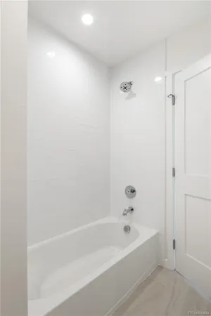 a bathroom with a bathtub