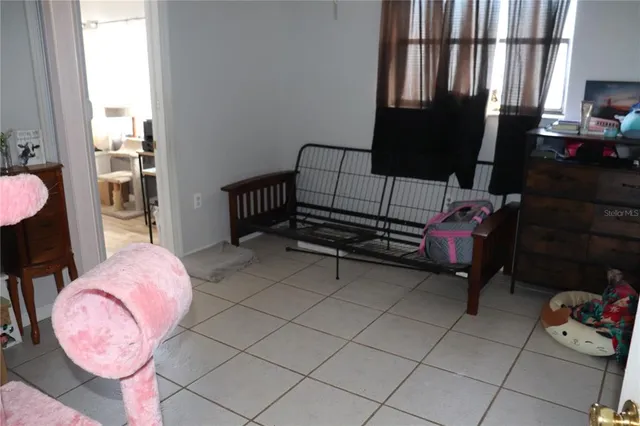 a bathroom with a sink mirror and toilet