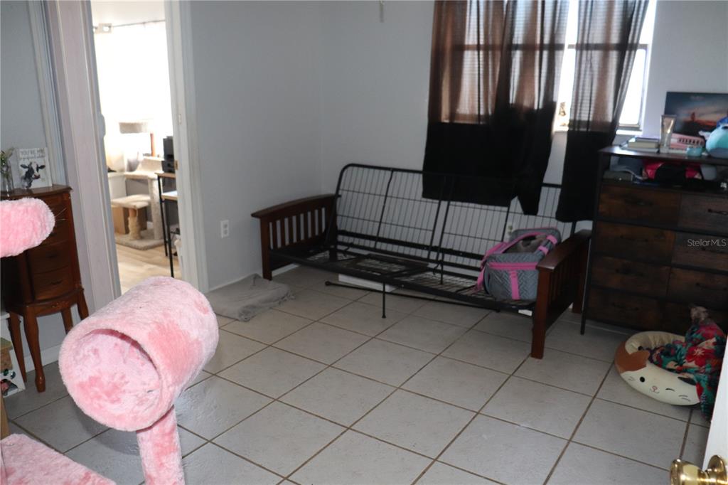 12387 Seagate Street Spring Hill, FL 34609 - Photo 20 of 51 a bathroom with a sink mirror and toilet