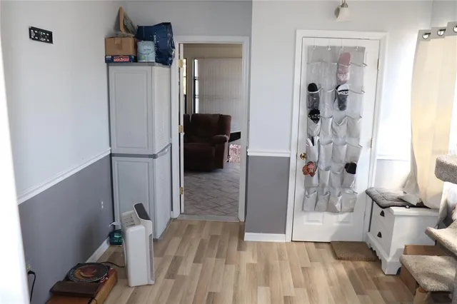 a view of a room that has a couch and a table in it