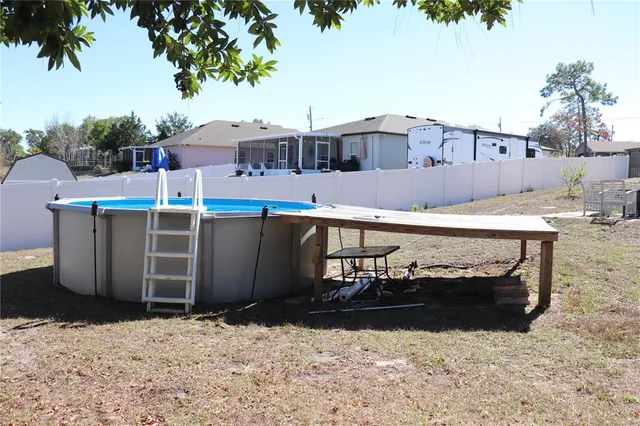 a view of a house with snow on the ground