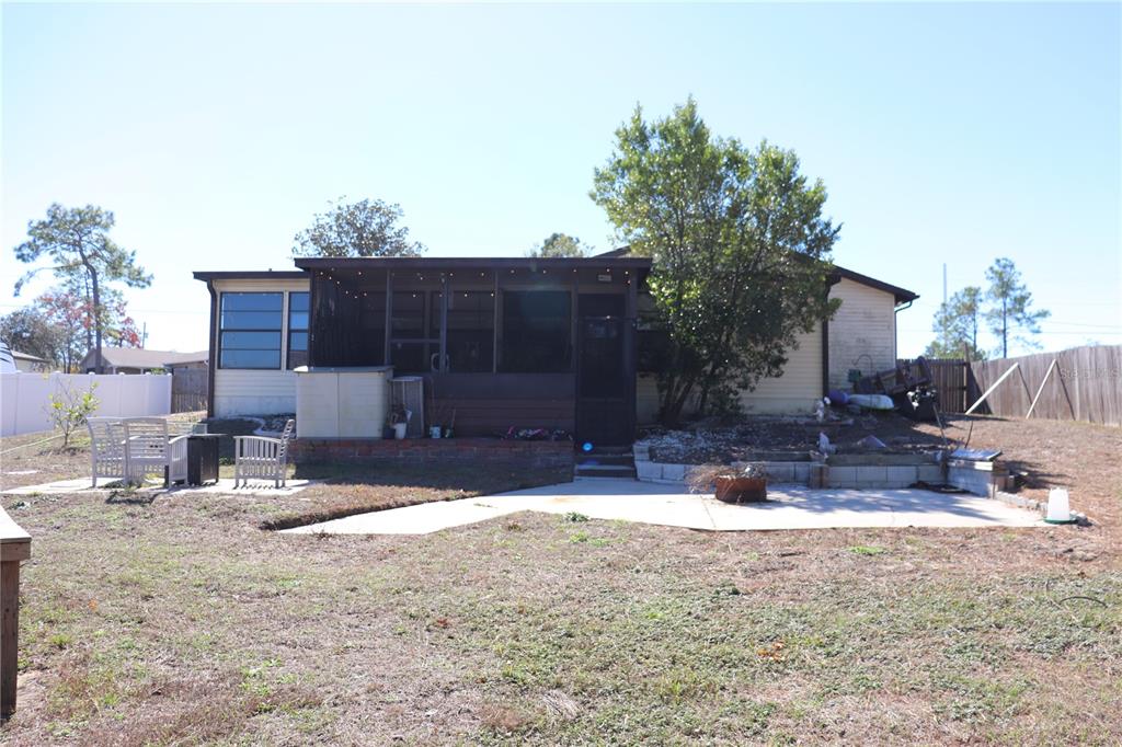 12387 Seagate Street Spring Hill, FL 34609 - Photo 41 of 51 a view of a house with snow on the ground
