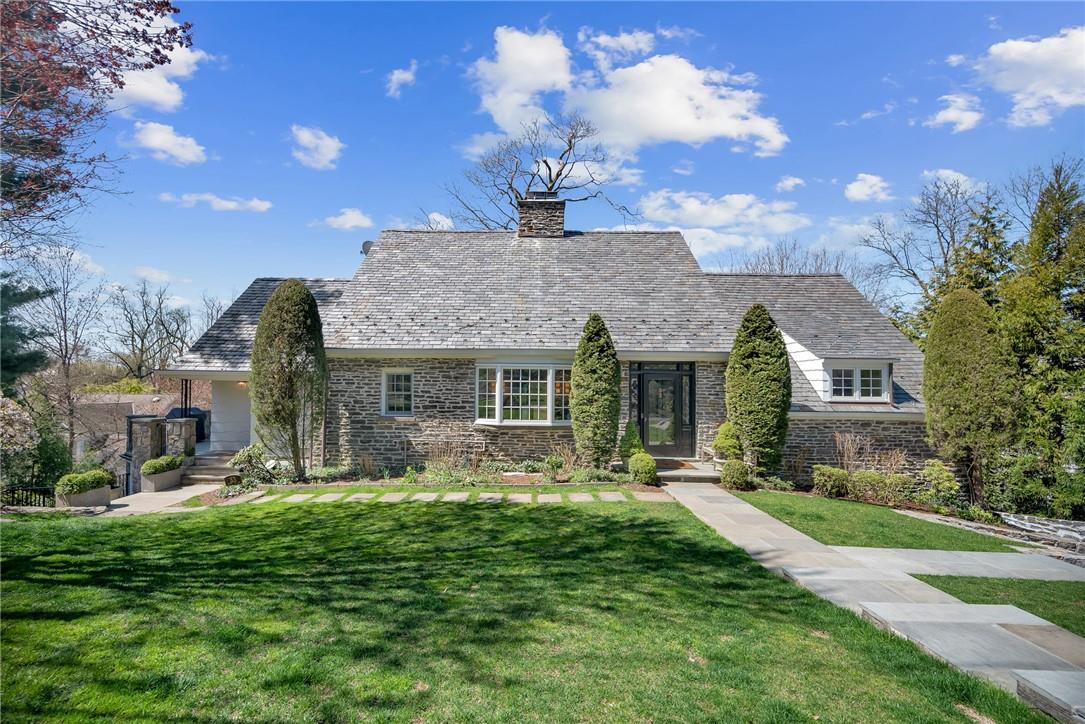 33 Summit Avenue Bronxville, NY 10708 - Photo 1 of 1 a front view of a house with garden