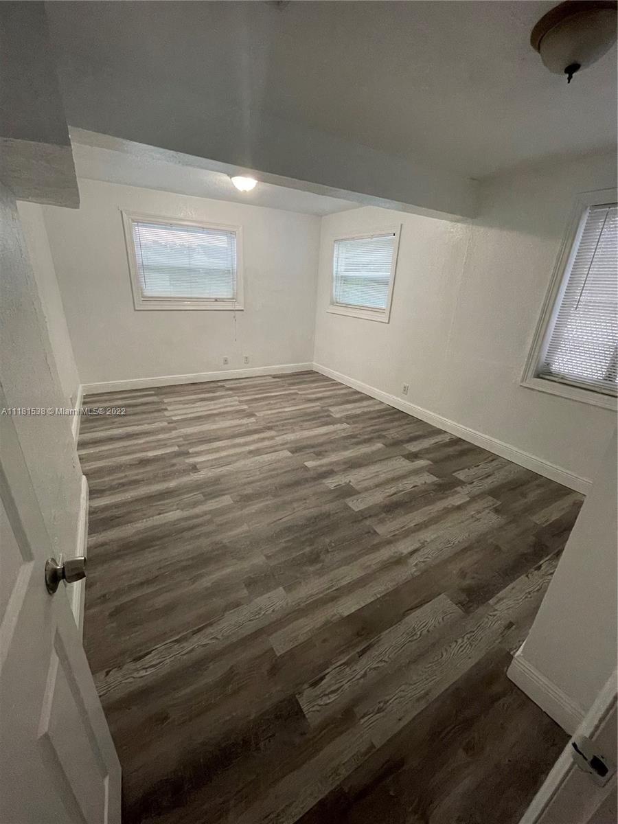 832 West 4th Street Riviera Beach, FL 33404 - Photo 7 of 21 a bathroom with a sink and a window