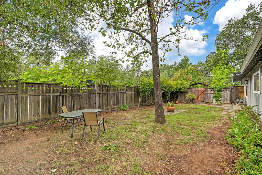 6689 Rhodes Avenue Placerville, CA 95667 - Photo 11 of 60 a backyard of a house with table and chairs