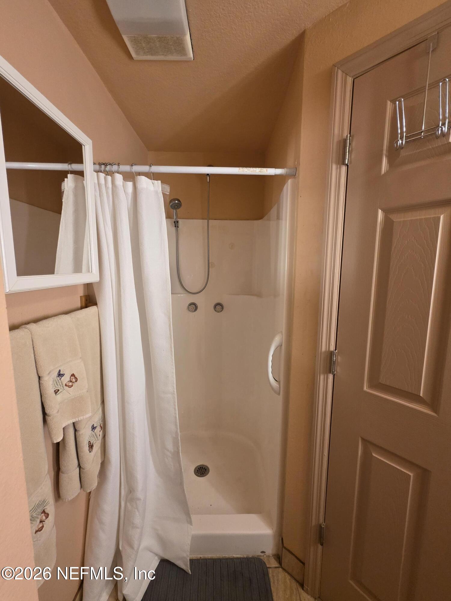 508 Edgewood Avenue Crescent City, FL 32112 - Photo 29 of 71 a bathroom with a shower and a glass door