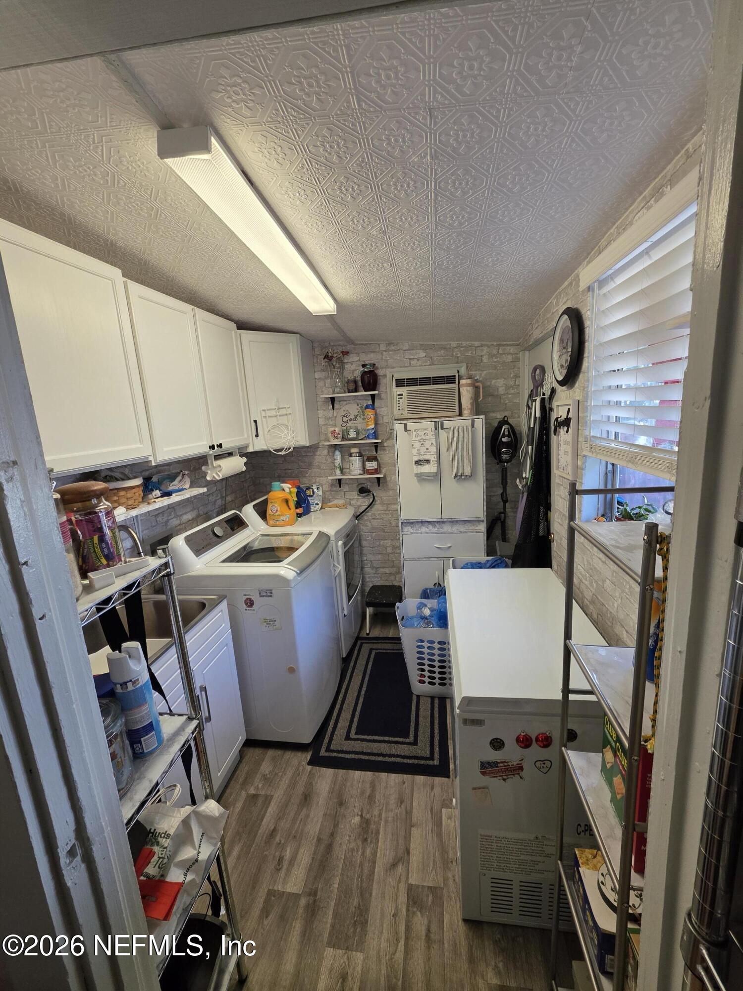 508 Edgewood Avenue Crescent City, FL 32112 - Photo 37 of 71 a storage room with washer and dryer