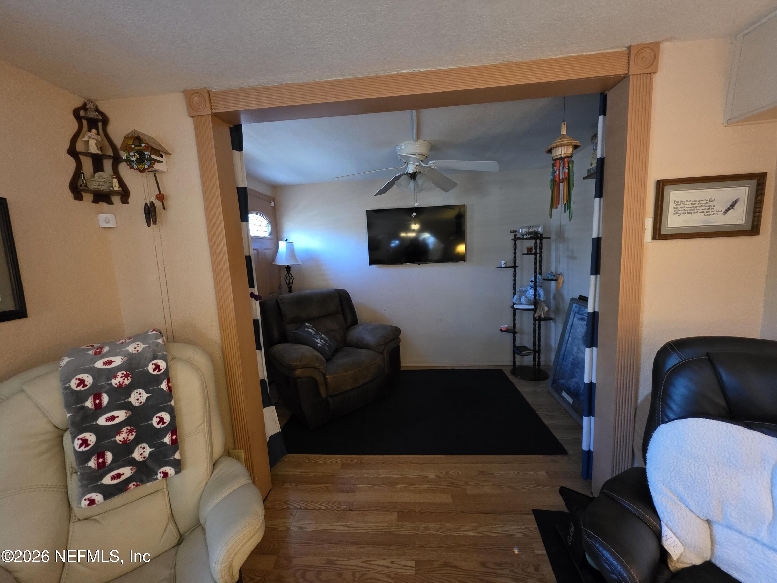508 Edgewood Avenue Crescent City, FL 32112 - Photo 4 of 71 a living room with furniture and a flat screen tv