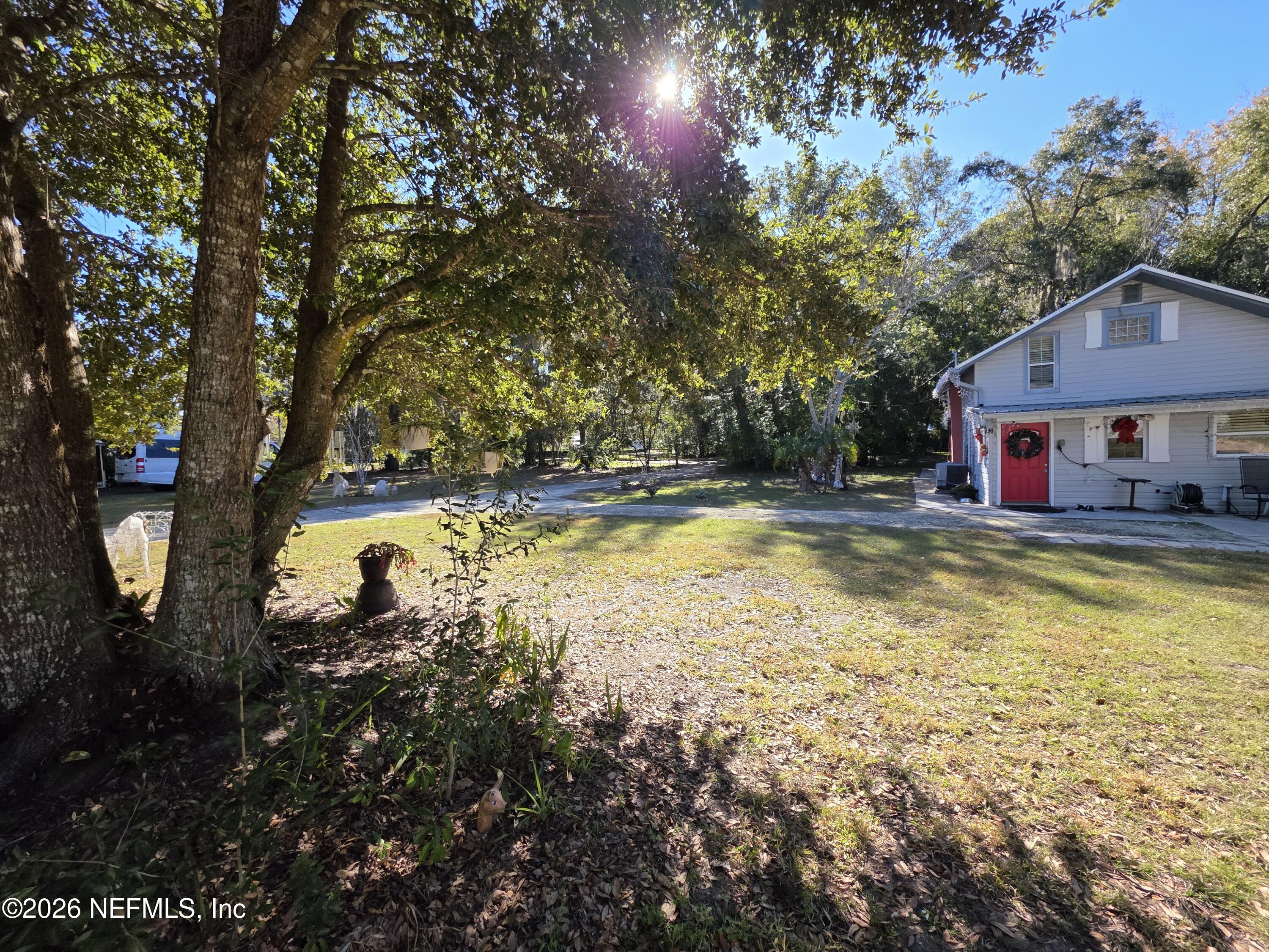 508 Edgewood Avenue Crescent City, FL 32112 - Photo 42 of 71 a swimming pool with outdoor seating and yard
